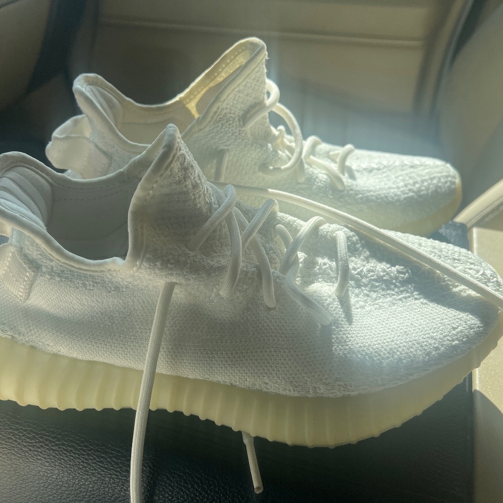 his is an Adidas Yeezy Boost 350 V2 "Cream White" sneaker.